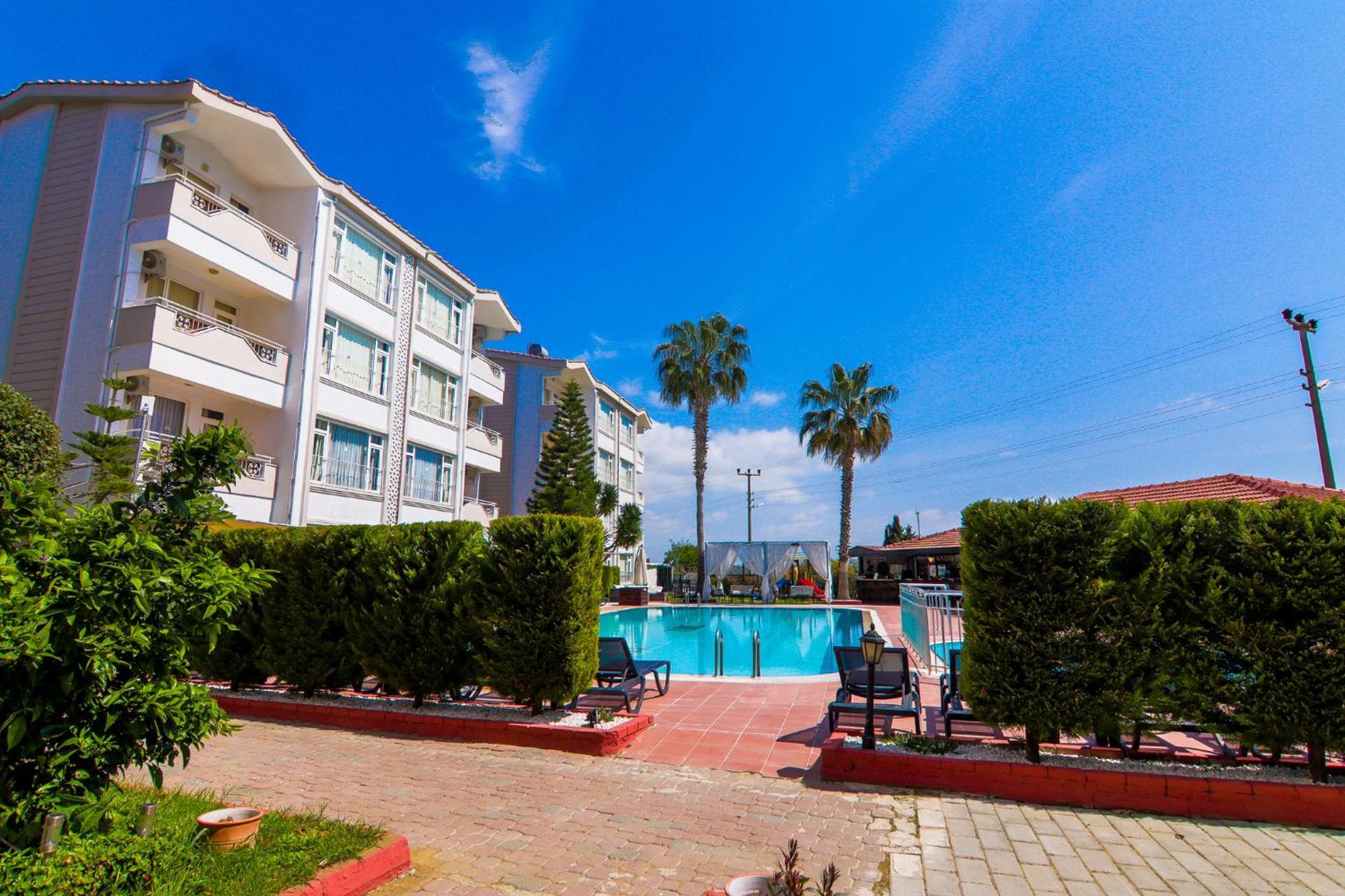 New Garden Hotel Side Exterior foto